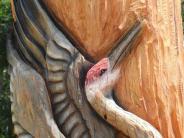 A close up of a chainsaw carving of a Sandhill Crane